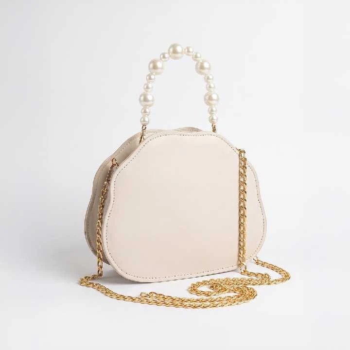 Cream pearl handle handbag for women with gold-tone chain strap