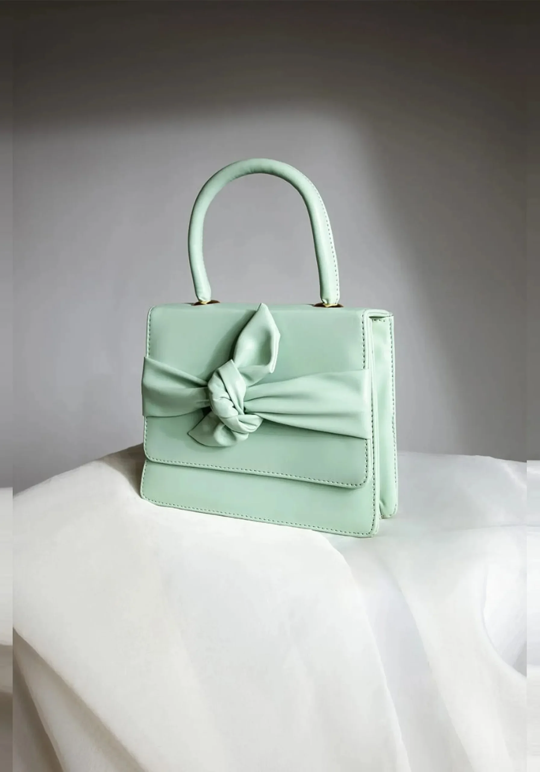 handbag with bow knot design for women
